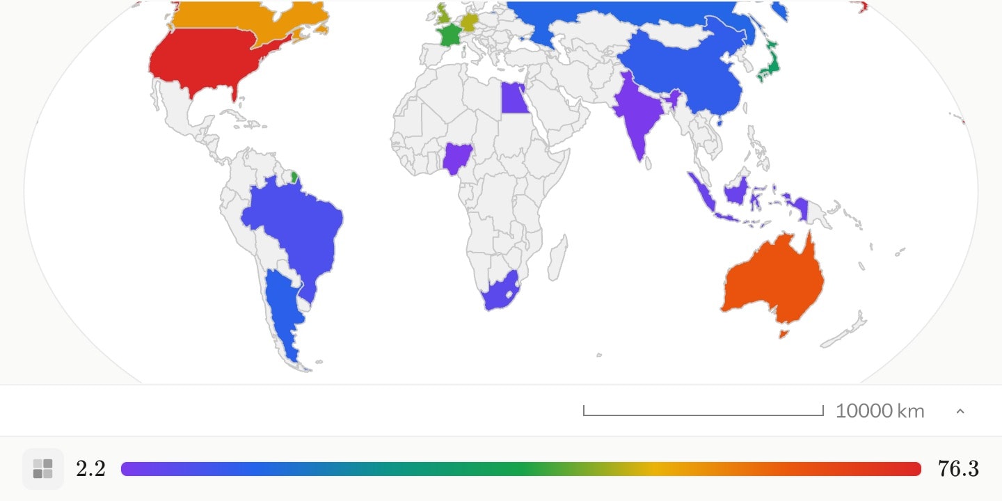 A world map with sixteen countries shaded by GDP per head, the United States reddest at the top of the scale and Australia orange just below it.